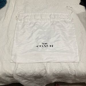 2 white satin Coach Dust Bags